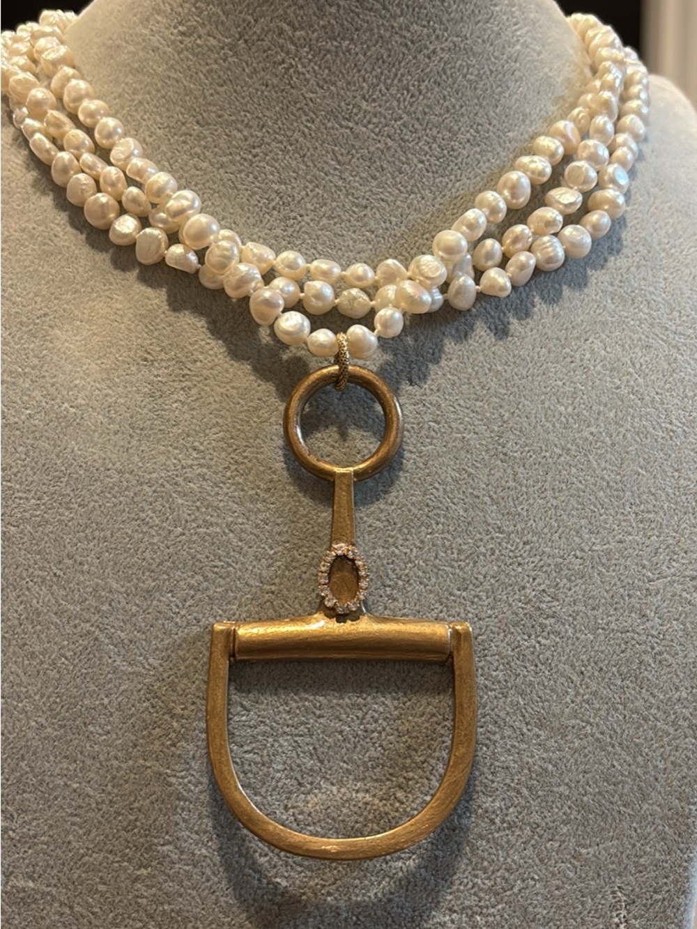Multi-Strand white freshwater Pearl Necklace with large Gold-Tone horse bit